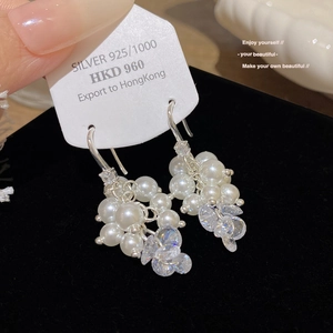 Detail view of grape cluster earrings with pearls and zircons on S925 silver hook