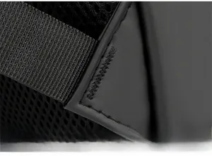 Detail shot of breathable mesh padding and reinforced bar-tack stitching on the backpack
