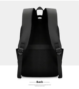 Detail view of the breathable honeycomb mesh back and luggage strap on black backpack