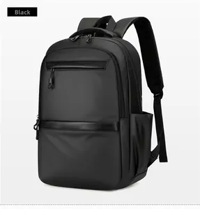 Detail of durable waterproof fabric and ergonomic mesh straps on the black business backpack
