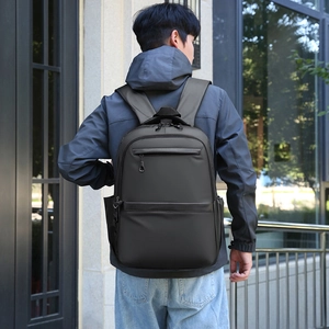 Large capacity waterproof business travel backpack in dark grey for commuting