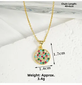 Macro shot of gold round pendant with colorful zircons, measuring 1.7x1.4cm, weight 3.4g