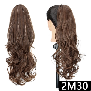 Detailed view of the layered inner structure and long wavy texture of the claw ponytail