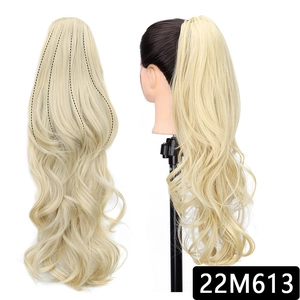 Detail showing the inner structure and platinum blonde wavy ponytail extension on a mannequin