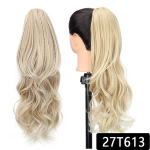 Detailed view of claw clip ponytail extension in wavy 27T613 ash blonde shade