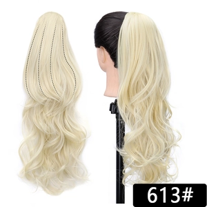 Detail view of 613# platinum blonde wavy ponytail hair extension with texture and length