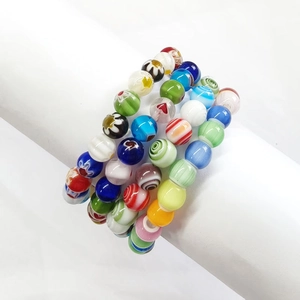 Colorful 8mm beaded bracelet set featuring floral patterns and vibrant glass charms