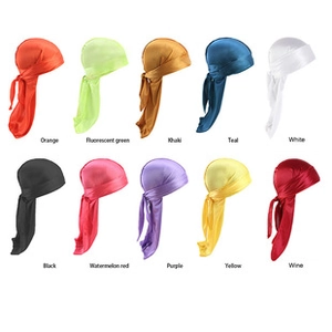 Collection of ten colorful silky durags with long straps in various vibrant shades
