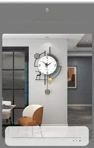 Detail of modern wall clock with deer silhouette, metal frame and pendulum, 35x62cm
