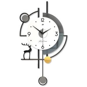Modern minimalist wall clock with black and white geometric design and golden accents