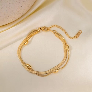 Elegant gold double-layer snake chain bracelet with beads made of titanium steel
