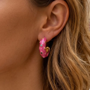 Pink marble enamel C-shaped hoop earrings with blue zircon inlays on model