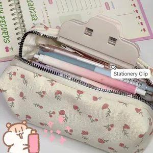 Floral canvas pencil case with large capacity and matching stationery clip on notebook
