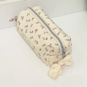 Floral cream canvas pencil case with a cute plush rabbit pendant and zipper closure