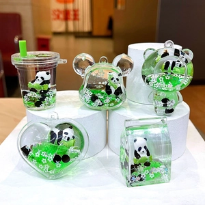 Panda liquid sand keychain set in acrylic tea cup and heart shapes with green liquid