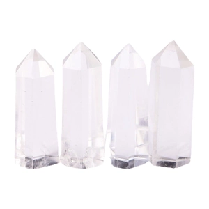 Set of four natural white clear quartz hexagonal crystal columns for home decor