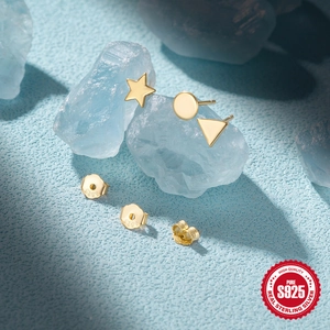 Detail of three-piece S925 sterling silver geometric stud earring set in gold finish