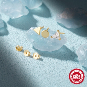 Detailed view of S925 sterling silver hallmarked backings with gold geometric studs