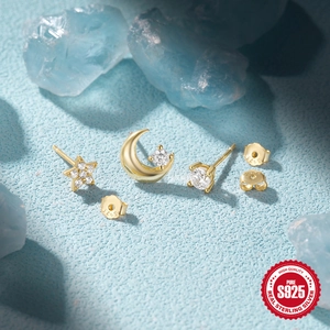 Detailed view of S925 sterling silver gold moon star stud earrings with clear zircon stones