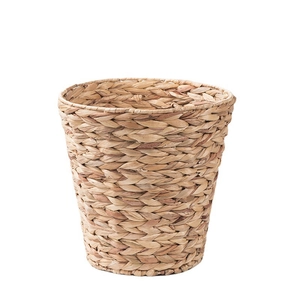 Handcrafted cylindrical seagrass storage basket with natural woven fiber textures