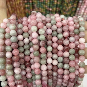 Close-up of 8mm colorful round chalcedony beads with natural translucent texture
