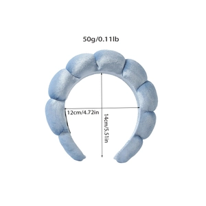 Detail showing dimensions of light blue puffy sponge headband with soft velvet texture