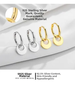 Detail of S925 sterling silver stamp and solid round disc pendant earrings