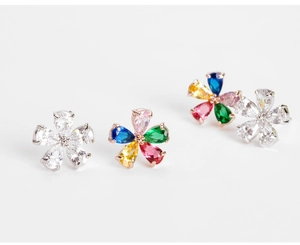 Detailed macro view of colorful floral stud earrings with multi-color cubic zirconia stones