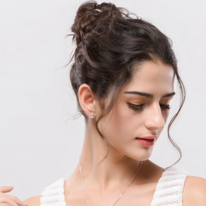 Exquisite silver flower earrings with zircon inlays and minimalist thin necklace on model