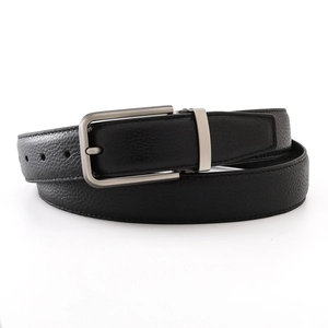 Close-up of black litchi grain leather belt with silver brushed alloy pin buckle