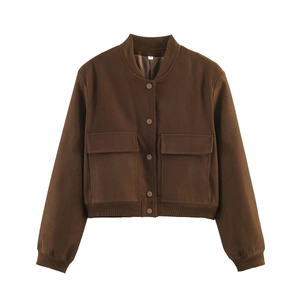 Detail of dark brown jacket showing stand collar, front snap buttons, and large utility pockets