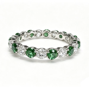 S925 sterling silver eternity ring with alternating green and clear round gemstones