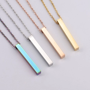 Detail of minimalist rectangular bar necklaces in silver, gold, rose gold and rainbow colors