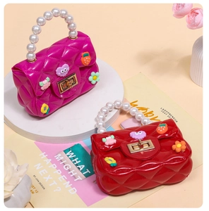 Quilted jelly crossbody bag for girls with pearl handle and strawberry cartoon patches