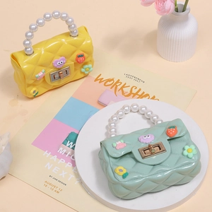 Mini jelly crossbody bag for girls with pearl handle and cartoon floral charms