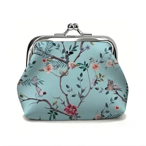 Floral print coin purse with vintage silver metal clasp closure on light blue background
