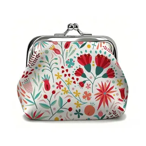Close-up of the vintage metal clasp and floral canvas fabric on the coin purse