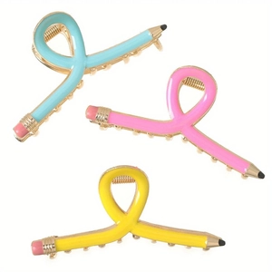 Creative pencil shaped hair claws in blue, pink and yellow metal finishes