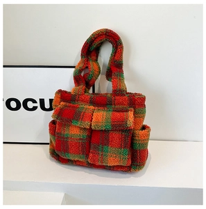 Detailed close-up of colorful checkered plush tote bag with soft lamb wool texture
