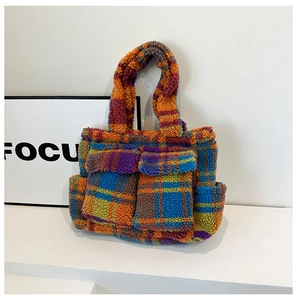 Detailed view of the multi-pocket colorful checkered plush tote bag with fuzzy texture