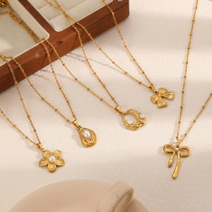 Elegant 18k gold stainless steel necklace collection with pearl and bowknot pendants