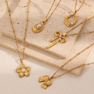 French vintage 18k gold plated stainless steel necklaces with pearl bow and floral pendants