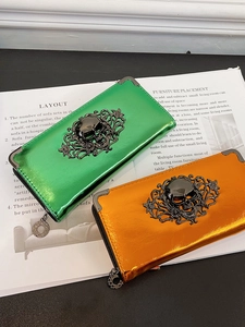 Glossy leather long wallet with skull embossed pattern and metallic punk style finish