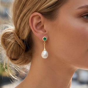 Luxurious 18K gold plated drop earrings with emerald green stone and white teardrop pearl