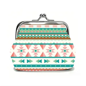 Detail of bohemian geometric pattern canvas coin purse with silver metal kiss-lock frame