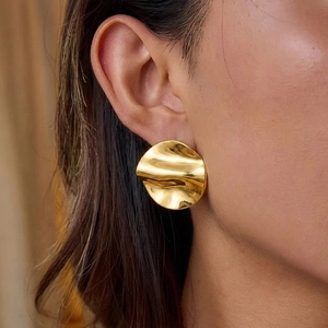 Minimalist gold irregular wave round stud earrings with polished textured finish for women