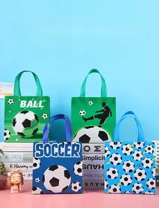 Detailed view of four football themed waterproof non-woven gift bags for soccer party favors