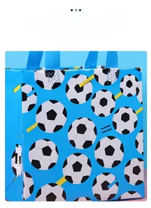 Detail of blue non-woven gift bag with football patterns and durable blue handles