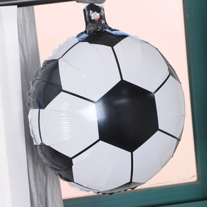 Close-up of 18 inch soccer foil balloon with classic black and white pentagon patterns