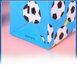 Detail showing the embossed bottom and stitching of the blue non-woven football gift bag